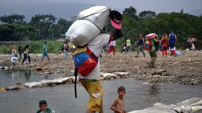 Voluntarios venezolanos proporcionan socorro humanitario a migrantes y refugiados